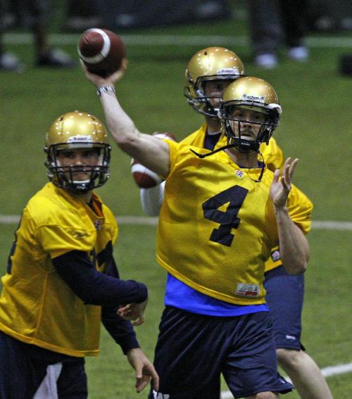 Stdup - Blue Bomber Mini Camp QB's LtoR Chase Clement ,Buck Pierce and Max Hall show their stuff -  at  Wpg Indoor Soccer Complex at UofM . KEN GIGLIOTTI / April . 26 2013 / WINNIPEG FREE PRESS