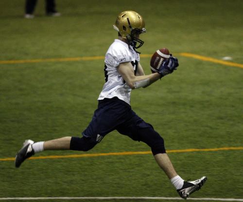 Stdup - Blue Bomber Mini Camp #88 Jade Etienne makes catch in full stride as he had an impressive camp -  at  Wpg Indoor Soccer Complex at UofM . KEN GIGLIOTTI / April . 26 2013 / WINNIPEG FREE PRESS