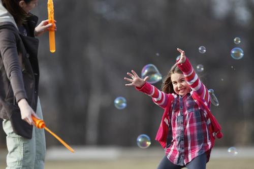 April 27, 2013 - 130427  -  Lindsay Aboud and her niece Isabella play with bubbles at Assiniboine Park Saturday, April 27, 2013. John Woods / Winnipeg Free Press