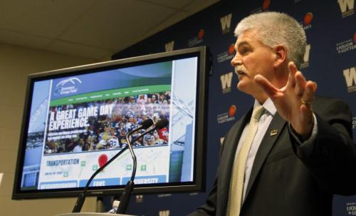 Jim Bell, VP and COO with the Winnipeg Blue Bombers unveils the new Event Day website and nine point transportation and parking plan for Investors Group Field at a news conference Tuesday.Wayne Glowacki/Winnipeg Free Press April 30 2013