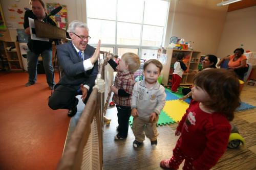 Manitoba Premier Greg Selinger holds press conference at Morrow Avenue Child Care Centre announcing new  provincial support for child-care spaces for Manitoba families Wednesday morning. 21 month old Jayden gives Premier a high five after announcement   while playing in the infant area at centre just next to press conference. No last name used. See Adam Wazny's story.    Photography Ruth Bonneville Ruth Bonneville /  Winnipeg Free Press)