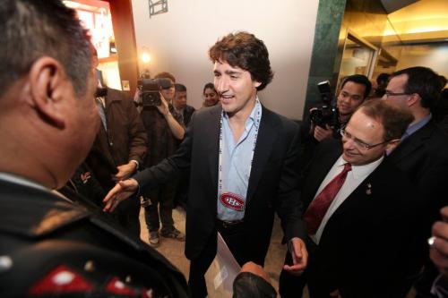 Liberal leader Justin Trudeau talks with the media and greets people in the food court at TD Centre in Winnipeg  over the lunch hour Thursday with MP Kevin Lamoureux.  Photography Ruth Bonneville Ruth Bonneville /  Winnipeg Free Press)