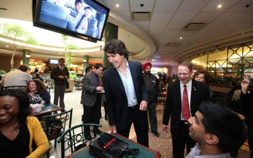 Liberal leader Justin Trudeau talks with the media and greets people in the food court at TD Centre in Winnipeg  over the lunch hour Thursday with MP Kevin Lamoureux.  Photography Ruth Bonneville Ruth Bonneville /  Winnipeg Free Press)