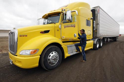 Long haul transport Trappers  Transit truck driver Thomas Tenner makes his weekly  run  to the US to deliver  french fries down   Hwy 75 through Emerson  - Randy Turner story - KEN GIGLIOTTI / May 2  2013 / WINNIPEG FREE PRESS