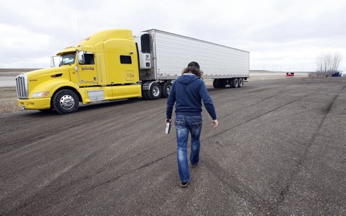 Begins his trip at  Trappers faclity in Transcona - Long haul transport Trappers  Transit truck driver Thomas Tenner makes his weekly  run  to the US to deliver  french fries down   Hwy 75 through Emerson  - Randy Turner story - KEN GIGLIOTTI / May 2  2013 / WINNIPEG FREE PRESS