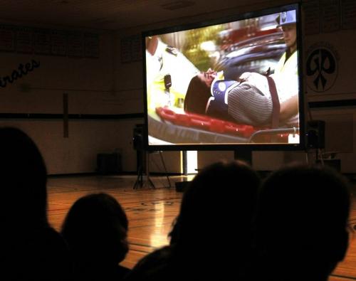 Students at Grant Park High School watch a graphic story that is  part of  the MADD presentation 2013 School Assembly Program.  The program's purpose is to get the message into kids heads:Dont Drink and Drive.  Alex Paul story(WAYNE GLOWACKI/WINNIPEG FREE PRESS) Winnipeg Free Press May 3  2013