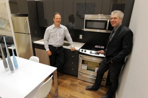 Doug McKay and Michael Banman are involved in the display suite for Glass House Lofts  a new, cutting-edge downtown condo project. Photo taken at City Place. May 3, 2013  BORIS MINKEVICH / WINNIPEG FREE PRESS