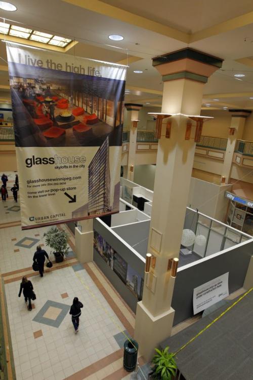 Doug McKay and Michael Banman are involved in the display suite for Glass House Lofts  a new, cutting-edge downtown condo project. Photo taken at City Place. May 3, 2013  BORIS MINKEVICH / WINNIPEG FREE PRESS