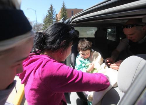 Savannah Malyon buckles her 3 year old son Nathaniel into his child seat after leaving  the Portage Hospital Saturday afternoon after Nathaniel's escape from his home in Sidney Manitoba Friday night.  Nathaniel Dailey  snuck out of his home around 10:30pm Friday night and was found playing in a ditch near number one highway Saturday morning. He was transferred with his mom from Portage hospital to the Children's Hospital in Wpg. Saturday afternoon  for further assessment.   See story for details.  Photography Ruth Bonneville Ruth Bonneville /  Winnipeg Free Press)