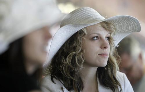 Krista Hodgins from Portage la Prairie watches the 139th Kentucky Derby with Sherry Cote, Ryan Cote and Blair Cote at Assiniboia Downs, Saturday, May 4, 2013. (TREVOR HAGAN/WINNIPEG FREE PRESS)