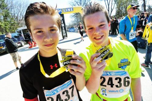 Matt Soltys (left), 12, and Scott English, 13, are the youngest to have finished the Winnipeg Police Service half marathon at Assiniboine Park Sunday.  130505 May 05, 2013 Mike Deal / Winnipeg Free Press
