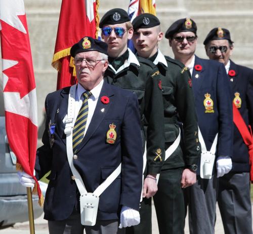 Veterans stand at attention during the speeches after the Annual Decoration Day Service Parade, which this year also commemorated the 60th Anniversary of the ceasefire in Korea. 130505 May 05, 2013 Mike Deal / Winnipeg Free Press