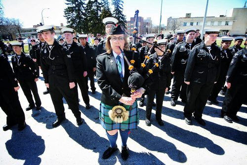 Barbie Sands Pipe Major of the 283 Anavets Pipe Band plays the Amazing Grace while Navy Cadets stand at attention during the ceremonies at the Memorial Boulevard Cenotaph after the Annual Decoration Day Service Parade, which this year also commemorated the 60th Anniversary of the ceasefire in Korea. 130505 May 05, 2013 Mike Deal / Winnipeg Free Press