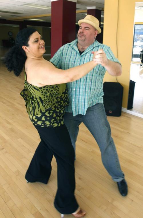 Alicia Cascaval co-owner/ Instructor at Arthur Murray Dance Studio  with Big Daddy Tazz during a practice session for the  Dancing With Celebrities, the SMD/Easter Seals ballroom competition that takes place Saturday night.  Doug Speirs story.(WAYNE GLOWACKI/WINNIPEG FREE PRESS) Winnipeg Free Press May 6 2013