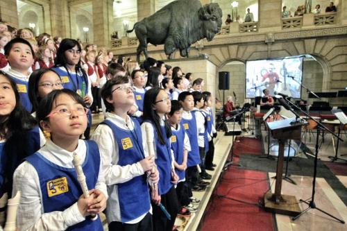 Students from schools across Winnipeg gathered in the foyer of the Manitoba Legislative Building to perform during a live video feed of Commander Chris Hatfield who is on the International Space Station. Thousands of students from across the country are celebrating Music Month today by singing together via a live feed with Commander Hatfield.  130506 May 06, 2013 Mike Deal / Winnipeg Free Press
