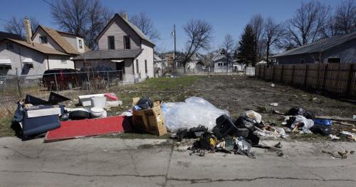 Garbage dumped on vacant lot on Magnus Ave. - City of Winnipeg is cracking down on illegal dumping of garbage  with tougher new fines  , also reducing the number of derelict properties by one third .bart kives story  KEN GIGLIOTTI / May 6  2013 / WINNIPEG FREE PRESS