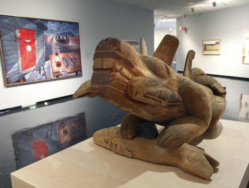WAG 100 Masters exhibit being set up in the Winnipeg Art Gallery Tuesday.  Sculpture by Bill Reid WASGO ( Sea Wolf) and at left is a painting by David Blackwood HOME FROM BRAGG'S ISLAND. Carolin Vesely story  (WAYNE GLOWACKI/WINNIPEG FREE PRESS) Winnipeg Free Press May 7 2013