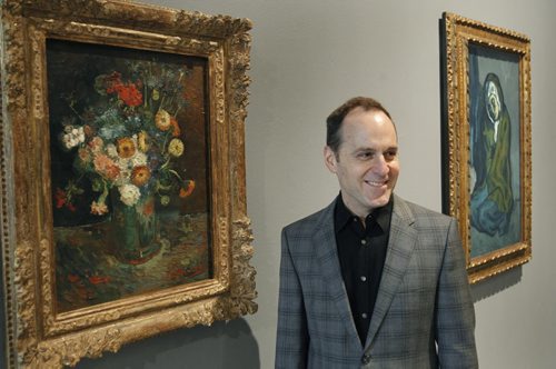 WAG 100 Masters exhibit being set up in the Winnipeg Art Gallery Tuesday.  Stephen Borys, Executive Director, Wag with left Vincent van Gogh's painting VASE WITH ZINNIAS AND GERANIUMS and a  painting by Pablo Picasso LA MISEREUSE ACCROUPIE.   Carolin Vesely story  (WAYNE GLOWACKI/WINNIPEG FREE PRESS) Winnipeg Free Press May 7 2013