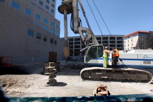 PCL workers begin drilling piles for what is believed to be a highrise hotel in Winnipeg just north of  201 Portage (old Canwest building) on the west side of Main street.  .See Bart Kives Story.  Photography Ruth Bonneville Ruth Bonneville /  Winnipeg Free Press)