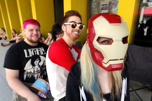 Allie Molnar has an Ironman mask on while waiting for the Light concert to start on at the Garrick Centre. Her and all her friends were there at 8am.  May 7, 2013  BORIS MINKEVICH / WINNIPEG FREE PRESS
