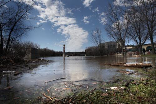 Assiniboine River high above walkway at the Forks Wednesday afternoon. May 08, 2013 Standup    Photography Ruth Bonneville Winnipeg Free Press