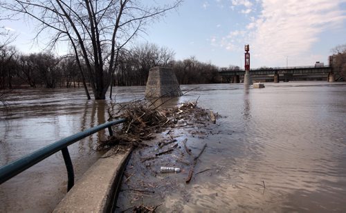 Assiniboine River high above walkway at the Forks Wednesday afteroon.  May 08, 2013 Standup    Photography Ruth Bonneville Winnipeg Free Press