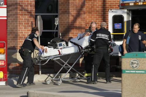 May 8, 2013 - 130508  -  Paramedics remove an unconscious male from the Norwood Hotel in Winnipeg Wednesday, May 8, 2013.  John Woods / Winnipeg Free Press