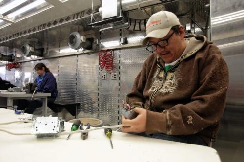 Loran Bird works on an electrical project in an Intro to Trades class inside the Red River College mobile campus at Rossburn Collegiate.  130508 May 08, 2013 Mike Deal / Winnipeg Free Press