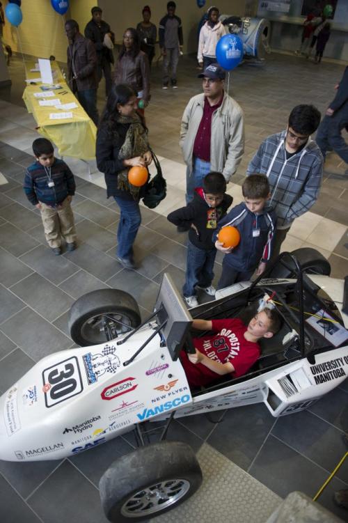 Saturday May 11 2013 - Winnipeg - DAVID LIPNOWSKI / WINNIPEG FREE PRESS  Ten year old Christophe Leroy tries out the race car simulator during the Science Rendevouz at the University of Manitoba EITC building Saturday afternoon. The event is a touring showcase of highly interaction science activities that included: a chemistry magic show, physics circus, and silmy surprises.