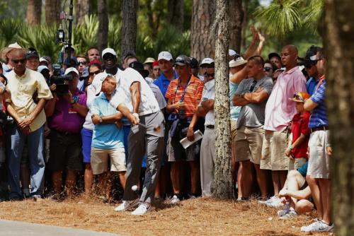 Tiger Woods of the U.S. hits from the rough on the second hole during the third round of The Players Championship PGA golf tournament at TPC Sawgrass in Ponte Vedra Beach, Florida May 11, 2013.  REUTERS/Chris Keane (UNITED STATES  - Tags: SPORT GOLF)   - RTXZIZW