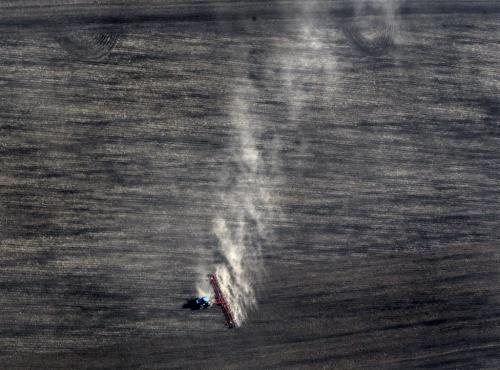 BACK TO THE LAND. A tractor and cultivator moves through a field east of Stonewall Monday afternoon raising a cloud of dust in the late afternoon light. STAND UP May 13, 2013 - (Phil Hossack / Winnipeg Free Press)
