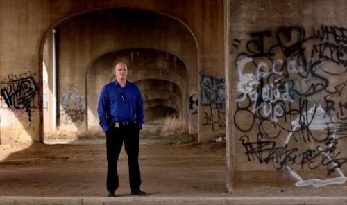 Prince Alber City Cop, Matt Gray poses in a downtown "viaduct" a location he often sees troubled youth....See Randy Turner's story re: Prince Albert's "Community Mobilization", a crime prevention project started in Glasgow Scotland, now cutting crime statistics proactivley in the small prairie city. May 9, 2013 - (Phil Hossack / Winnipeg Free Press)