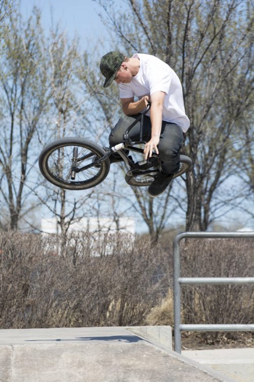 Winnipeg - Brayden Kowaluk enjoys the nice weather while riding his BMX on Wednesday afternoon at The Forks Plaza Skatepark. May 15 2013. 130515. Cole DeLaronde / Winnipeg Free Press.