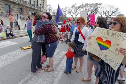 Bill 18. International day against Homophobia at the leg.  Evan Wiens gets a hug from Nancy Allan. May 16, 2013  BORIS MINKEVICH / WINNIPEG FREE PRESS