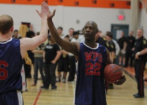 Winnipeg Police Basketball Team played against the youths involved in the 4Life Foundation at St. Johns High School, 401 Church Avenue from 12:00 noon - 1:30 pm. Chief Devon Clunis and several Winnipeg Blue Bomber Players played on the Winnipeg Police Basketball team. May 17, 2013  BORIS MINKEVICH / WINNIPEG FREE PRESS