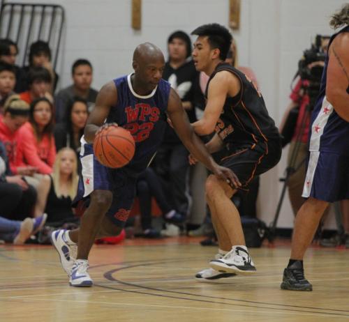 Winnipeg Police Basketball Team played against the youths involved in the 4Life Foundation at St. Johns High School, 401 Church Avenue from 12:00 noon - 1:30 pm. Chief Devon Clunis and several Winnipeg Blue Bomber Players played on the Winnipeg Police Basketball team. May 17, 2013 BORIS MINKEVICH / WINNIPEG FREE PRESS
