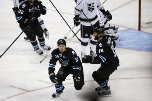San Jose Sharks' Logan Couture (39) reacts after scoring the game-winning goal against Los Angeles Kings in the overtime period during Game 3 of their NHL Western Conference semifinal playoff hockey game in San Jose, California, May 18, 2013. REUTERS/Stephen Lam (UNITED STATES - Tags: SPORT ICE HOCKEY) - RTXZSCS