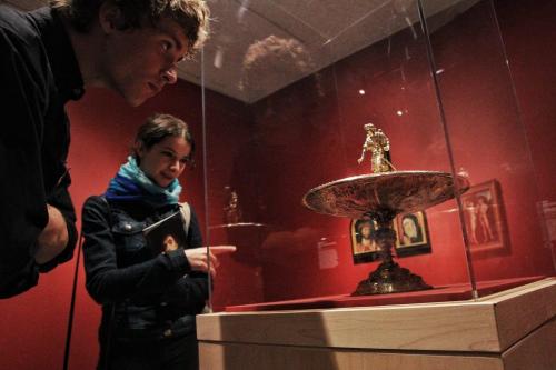 The Winnipeg Art Gallery is packed this rainy Victoria Day weekend as art lovers took the opportunity to visit the recently opened gallery titled, 100 Masters: Only in Canada.  Ben Roscoe (left) and Hannah Everest (right) look at a Roman bowl and figure that dates back to 1530-1570 and is one of twelve tazza (cup) depicting a Caesar of the Roman Empire.  The show includs the works of major paintings by Rembrandt van Rijn, Giovanni Paolo Panini, Claude Monet, Pierre-August Renoir, Vincent van Gogh, Pablo Picasso, Henri Matisse, Andy Warhol and many more. It will be open until August 18th. 130519 May 19, 2013 Mike Deal / Winnipeg Free Press