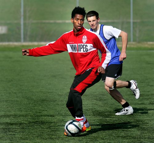 Ali Musse moves theball during WSA team practice Tuesday evening at a practice . Opening game is this coming weekend. See Tim Campbell's story. May 21, 2013 - (Phil Hossack / Winnipeg Free Press)