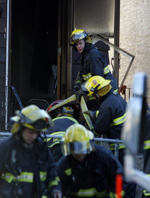 Wpg Fire responded to a hosue fire- Several people were evacuated , with one female taken to hospital when fire broke out in a two story home on 461 Manitoba Ave at Powers St before 6am  KEN GIGLIOTTI / May 22  2013 / WINNIPEG FREE PRESS