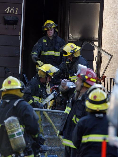 Several people were evacuated , with one female taken to hospital when fire broke out in a two story home on 461 Manitoba Ave at Powers St before 6am  KEN GIGLIOTTI / May 22  2013 / WINNIPEG FREE PRESS