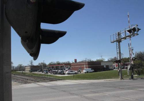 The train crossing across Marion St. near Rue Archibald. The train tracks pass by the Tim Hortons. with  story     (WAYNE GLOWACKI/WINNIPEG FREE PRESS) Winnipeg Free Press May 23 2013