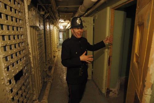 Vaughan St  Goal ( Jail ) tour for Doors Open Winnipeg will reopen for  weekend tours , built in 1881, and housed men , women and children , often in the same cell .Muddy Waters Tour operator Kristen Verin-Treusch has researched the  old jail and hosts the event in the costume of an 1880 vintage  police officer and takes great joy in relating the history of the remaining basement  cell block . KEN GIGLIOTTI / May 23  2013 / WINNIPEG FREE PRESS