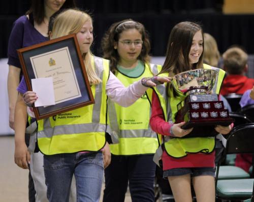 Victory School wins an award at the anual school patrol awards at the Winnipeg Convention Centre. Jessica Novak, Kaylee Leochko, and Makenna Boulard. May 24, 2013  BORIS MINKEVICH / WINNIPEG FREE PRESS
