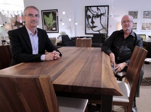 Homes. John Tinkler at left  and John Phelps are co-owners of Design Manitoba. They are with a live edge walnut table David Square's mentions in his story.  (WAYNE GLOWACKI/WINNIPEG FREE PRESS) Winnipeg Free Press May 24 2013