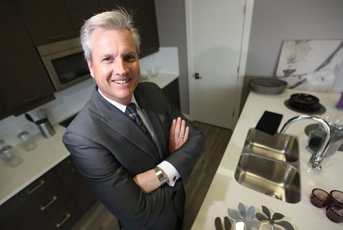 David Powell, of Powell Property Group, in the display kitchen at the Allure Condos Presentation Centre. A 73-unit condo development will be built at 3411 Pembina Highway. Friday, May 24, 2013. (TREVOR HAGAN/WINNIPEG FREE PRESS)