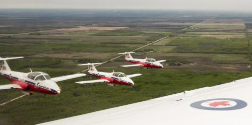 The Canadian Forces Snowbirds fly in formation, under low cloud cover north of Winnipeg on Saturday.  130525 - Saturday, May 25, 2013 - (Melissa Tait / Winnipeg Free Press)