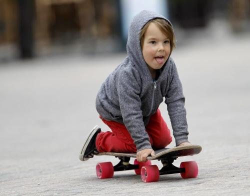 Charlie Salkeld, 3, cruises around on a skateboard at The Forks, Saturday, May 25, 2013. GPS Coordinates: 49.89N and -97.13W. For new section next week?? (TREVOR HAGAN/WINNIPEG FREE PRESS)