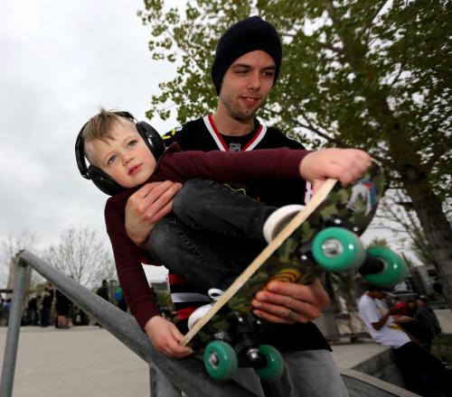 Cruz Friesen, 2, and his dad Dylan, at the skatepark at The Forks during the Skate 4 Cancer event, Saturday, May 25, 2013. (TREVOR HAGAN/WINNIPEG FREE PRESS)
