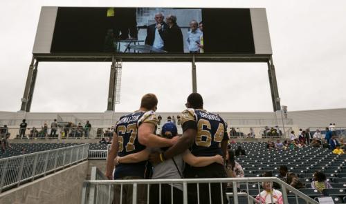 Chris Kowalczuk and Chris Greaves signed autographs and took photos at the first event held at Investors Group Field. About 15,000 people attended One Heart Saturday afternoon.  (Melissa Tait / Winnipeg Free Press)